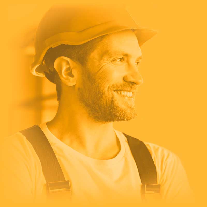 a happy man wearing a hard hat